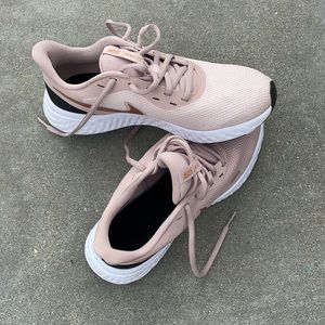 Pink Nike running shoes